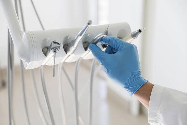 Professional Tooth Extraction technician working in Newport Beach, CA